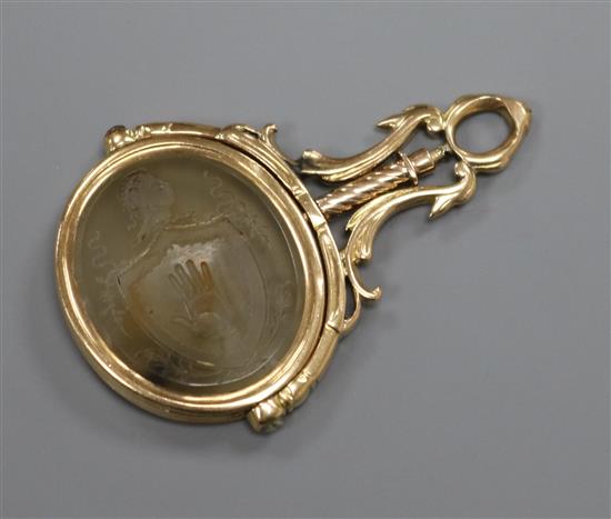 A 19th century yellow metal overlaid and agate spinning fob seal, 48mm.
